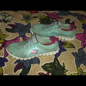 Blue and pink tennis shoes